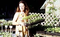 Dana overseeing the garden starts